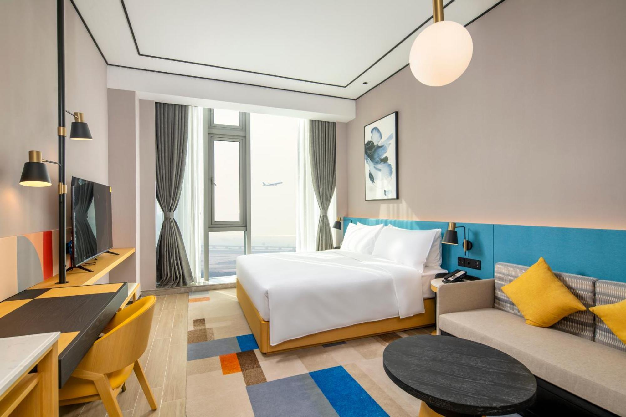 Hilton Garden Inn Shenzhen Airport,Enjoy 24-Hour One Way Free Delivery From Hotel To Shenzhen Baoan Airport On The Hour شينزين المظهر الخارجي الصورة