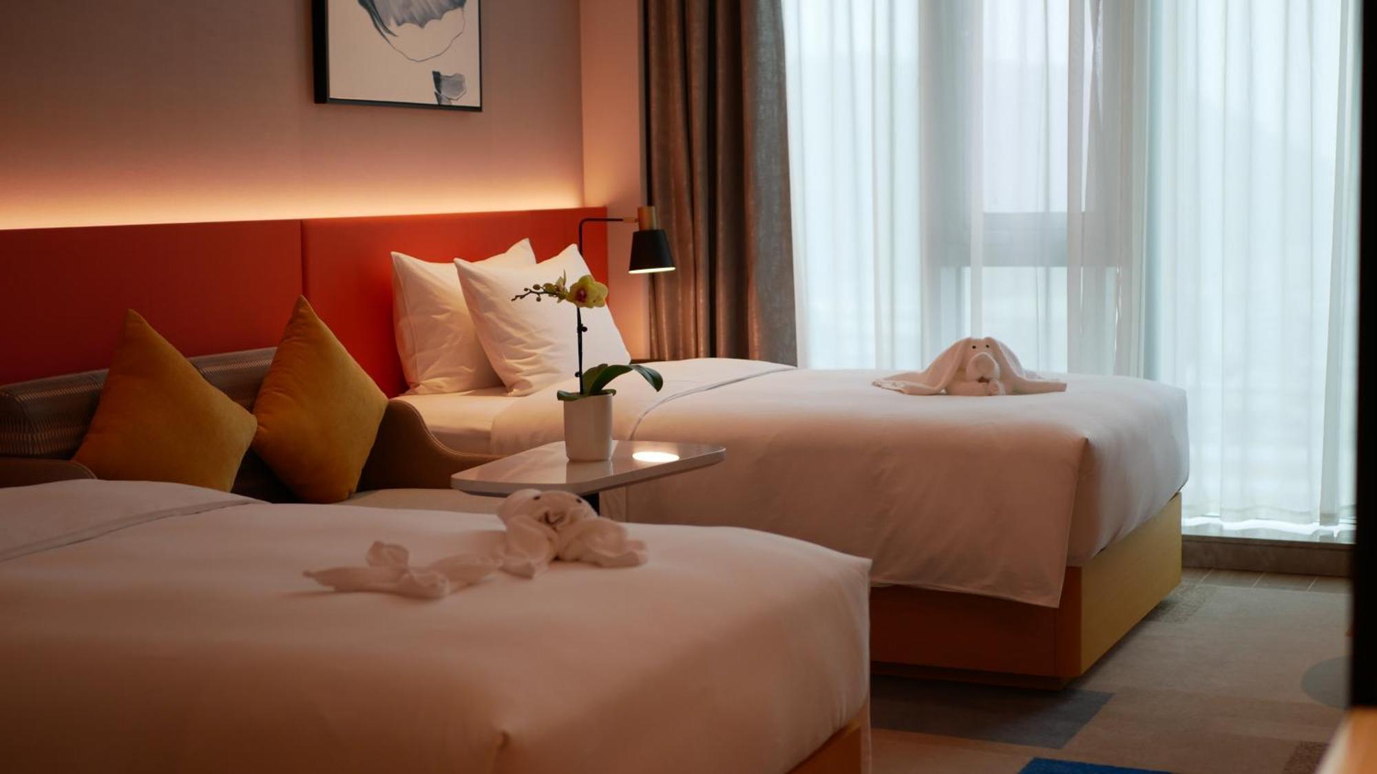 Hilton Garden Inn Shenzhen Airport,Enjoy 24-Hour One Way Free Delivery From Hotel To Shenzhen Baoan Airport On The Hour شينزين المظهر الخارجي الصورة