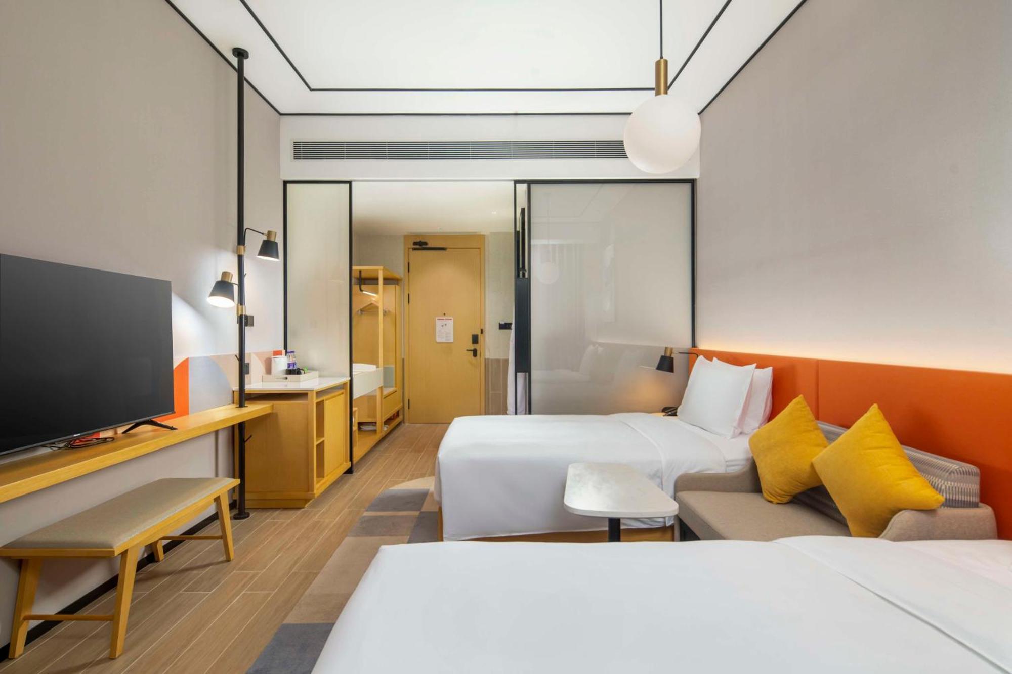 Hilton Garden Inn Shenzhen Airport,Enjoy 24-Hour One Way Free Delivery From Hotel To Shenzhen Baoan Airport On The Hour شينزين المظهر الخارجي الصورة