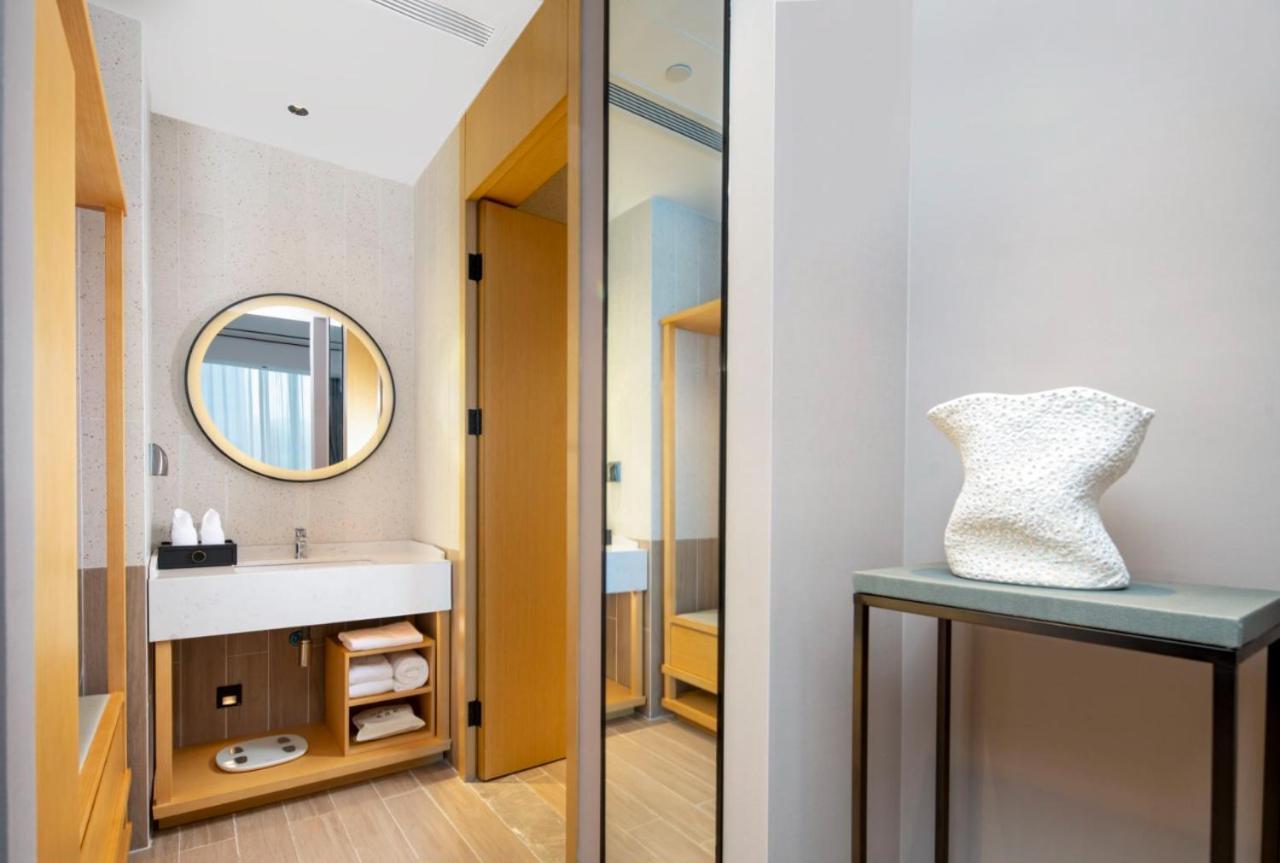 Hilton Garden Inn Shenzhen Airport,Enjoy 24-Hour One Way Free Delivery From Hotel To Shenzhen Baoan Airport On The Hour شينزين المظهر الخارجي الصورة