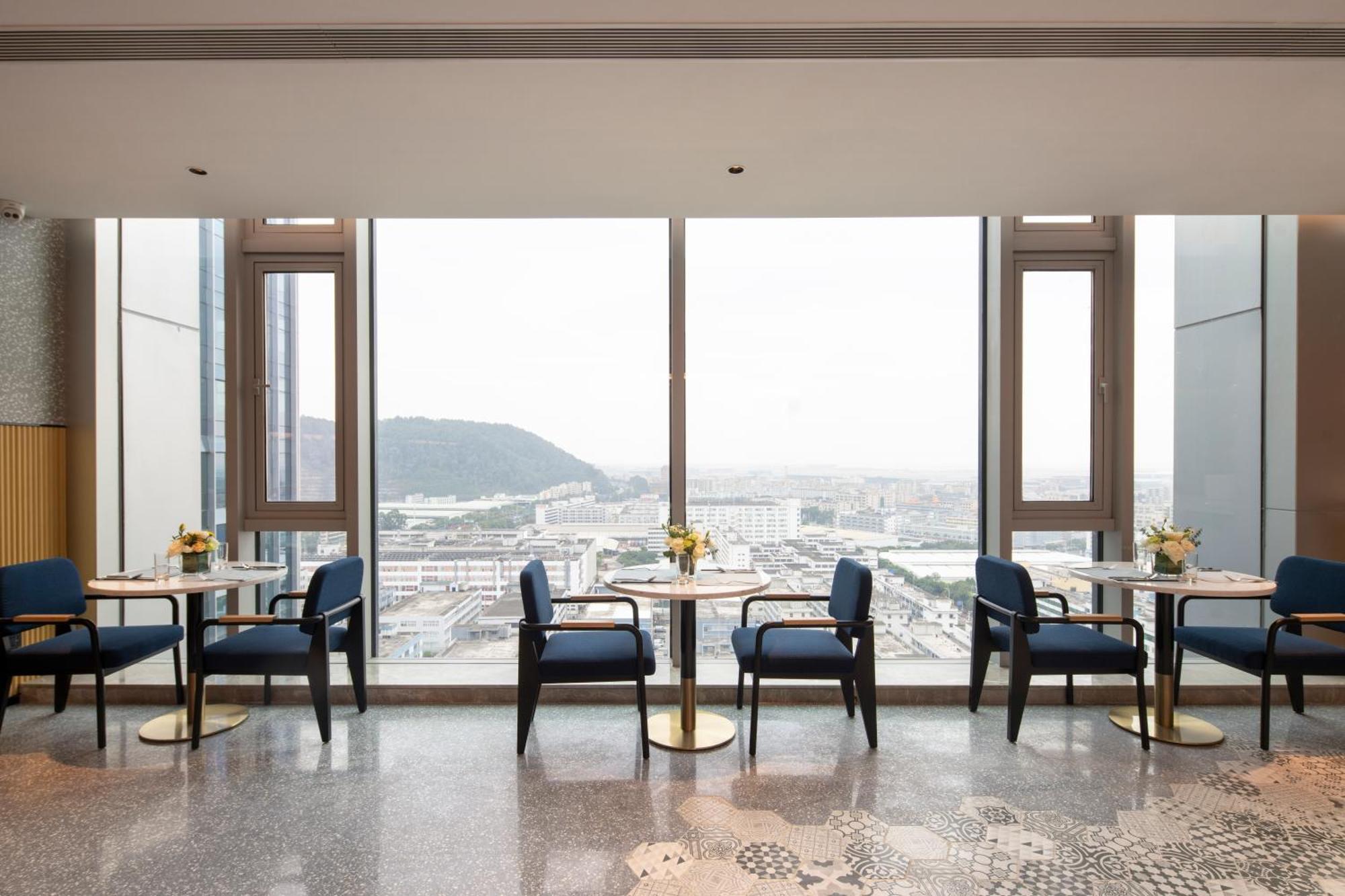 Hilton Garden Inn Shenzhen Airport,Enjoy 24-Hour One Way Free Delivery From Hotel To Shenzhen Baoan Airport On The Hour شينزين المظهر الخارجي الصورة